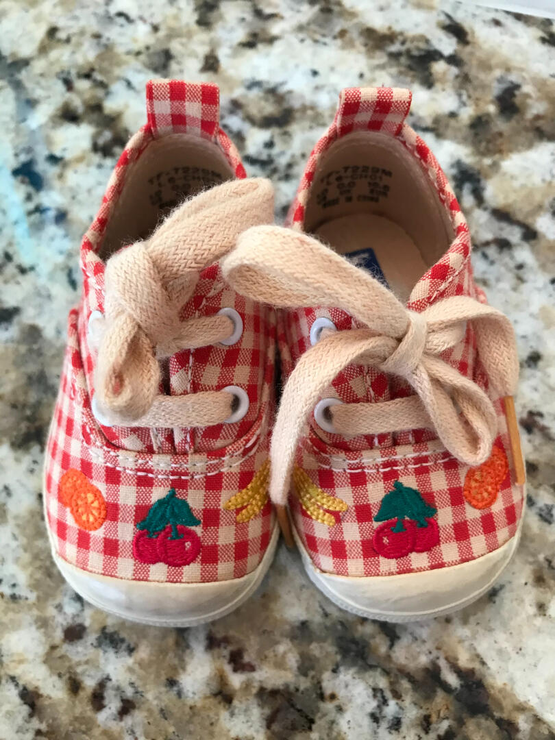 tiny human's quirky sneakers